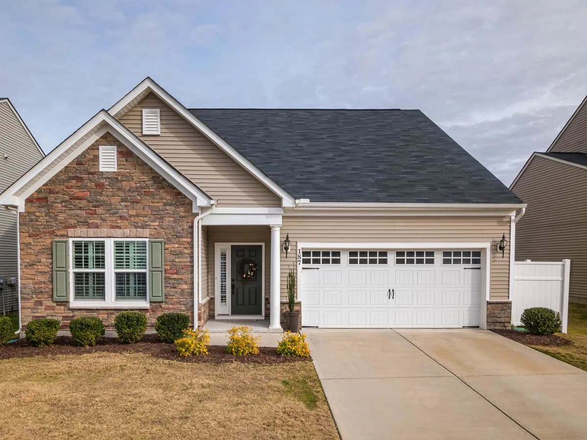 Residential home with a modern garage door